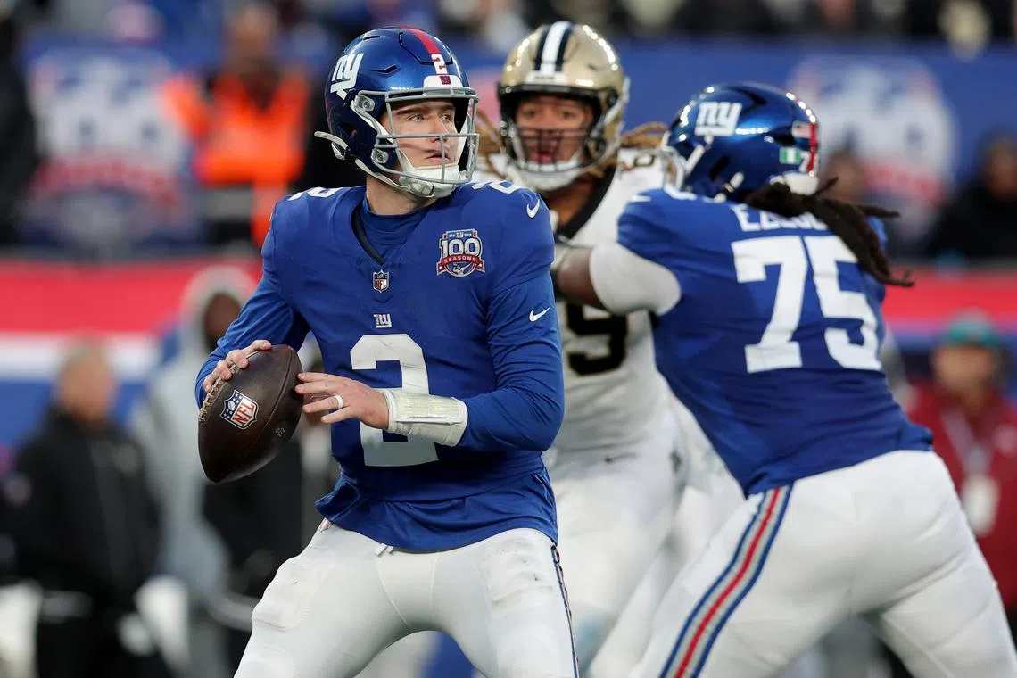 Dec 8, 2024; East Rutherford, New Jersey, USA; New York Giants quarterback Drew Lock (2) looks to pass against the New Orleans Saints during the fourth quarter at MetLife Stadium. Brad Penner-Imagn Images/File Photo