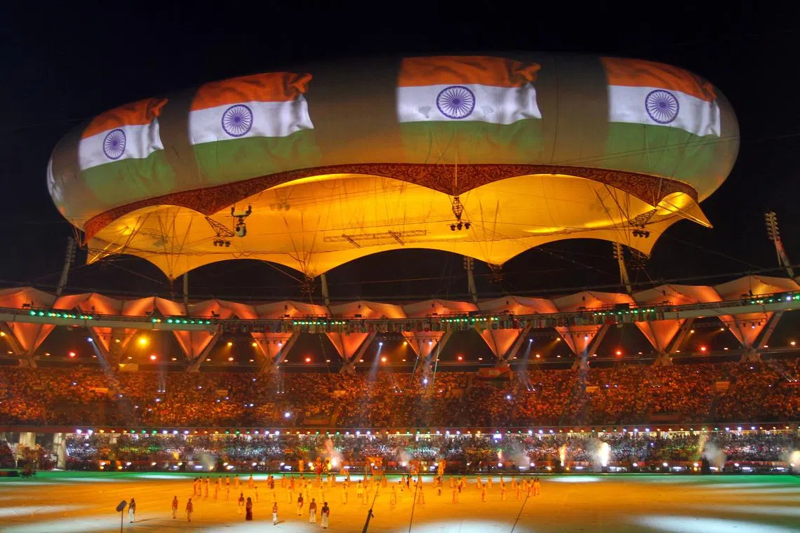 FILE PHOTO: The Indian national flag is projected onto a balloon during the Commonwealth Games closing ceremony at the Jawaharlal Nehru stadium in New Delhi October 14, 2010. REUTERS/B Mathur/File Photo