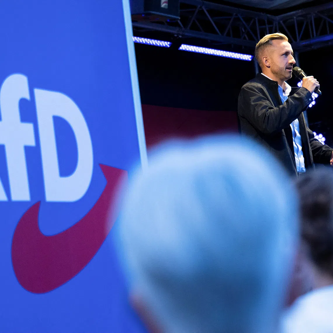 Ulrich Siegmund, top candidate of the far-right Alternative for Germany (AfD) party, speaks on stage during a campaign rally ahead of Germany's Saxony-Anhalt state election, in Naumburg, Germany August 24, 2026. REUTERS/Annegret Hilse