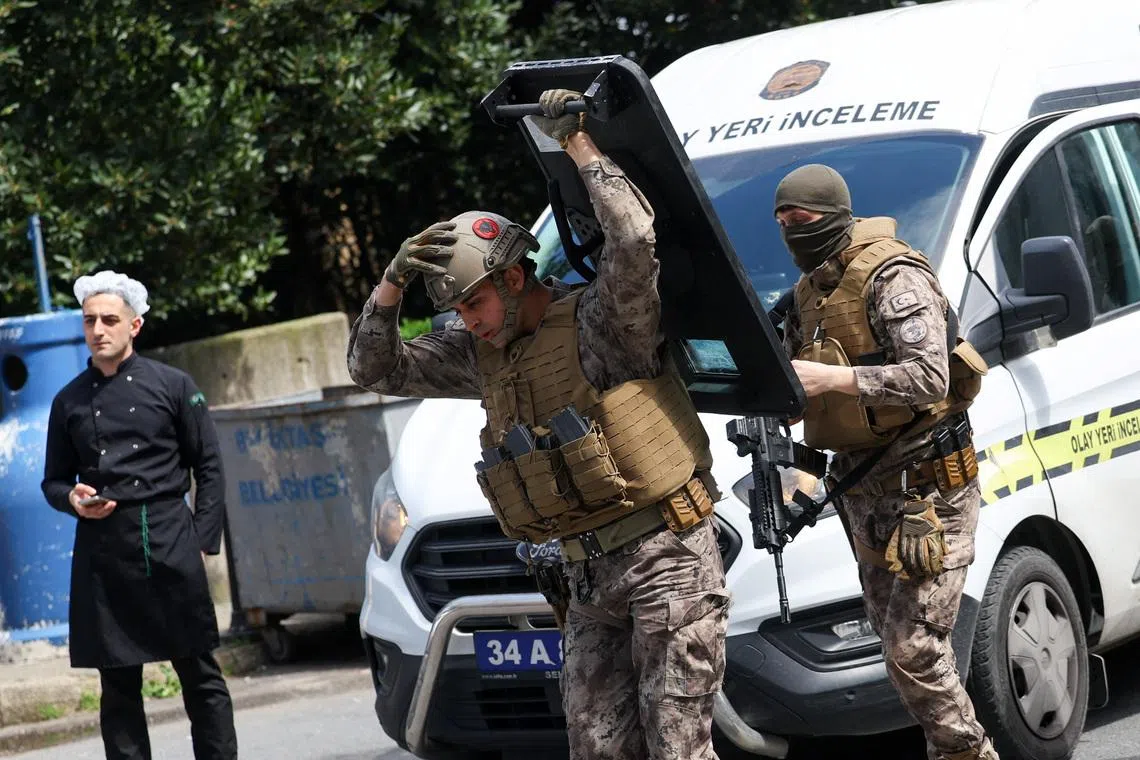 Turkish Police's special forces work at the scene, after gunfire was heard near the building housing the Israeli consulate, according to a witness, in Istanbul, Turkey, April 7, 2026. REUTERS/Murad Sezer
