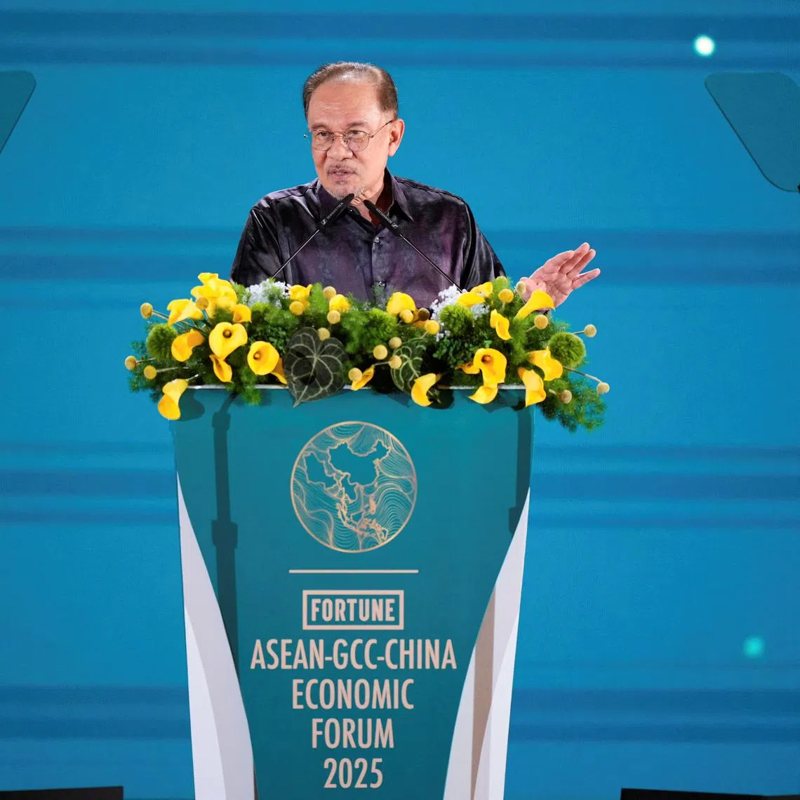 Malaysian Prime Minister Anwar Ibrahim, deliver his speech at the ASEAN - Gulf Cooperation Council (GCC) - China Economic Forum official dinner on the sidelines of the 46th Association of Southeast Asian Nations (ASEAN) Summit in Kuala Lumpur, Malaysia, Tuesday, May 27, 2025. 