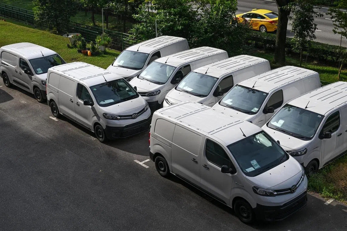 ST20230810_202334335754/ntvan13/Shintaro Tay/Lee Nian-Tjoe/

Unused electric vans parked outside dealerships at Toh Guan Centre on Aug 10, 2023. 

Unused electric vans have been left sitting at industrial areas. Some were registered between January and March 2023 to take advantage of a tax rebate but were never used. This suggest that Singapore's adoption rate of electric vehicles may not be as strong as the registration figures suggested.  