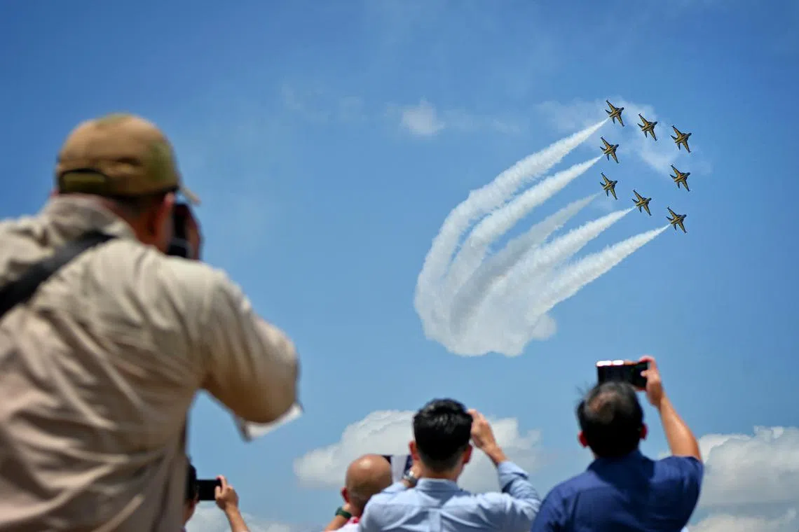 South Korea Air Force’s Black Eagles aerobatic team perform in their T-50Bs during an aerial display at the Singapore Airshow on Feb 22.