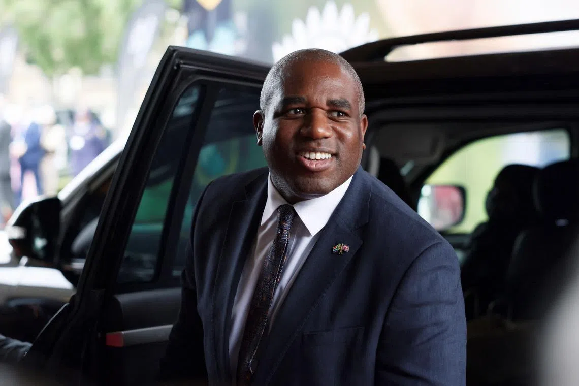 British Foreign Minister David Lammy walks out of a car to attend the meeting of the G20 foreign ministers, which is hosted by South Africa, under the theme 'Solidarity, Equality and Sustainability' at the NASREC conference center in Johannesburg, South Africa, February 20, 2025. REUTERS/Siphiwe Sibeko