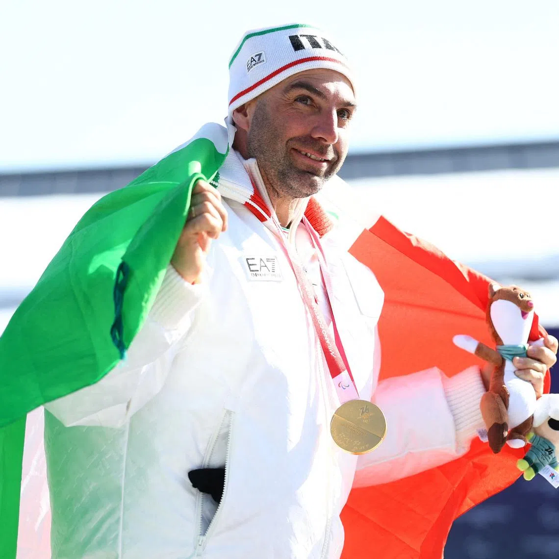 Milano Cortina 2026 Paralympics - Para Snowboard - Men's Snowboard Cross SB-LL2 Victory Ceremony - Cortina Para Snowboard Park, Cortina d'Ampezzo, Italy - March 08, 2026.  Gold medallist Emanuel Perathoner of Italy celebrates after winning the big final REUTERS/Lisi Niesner