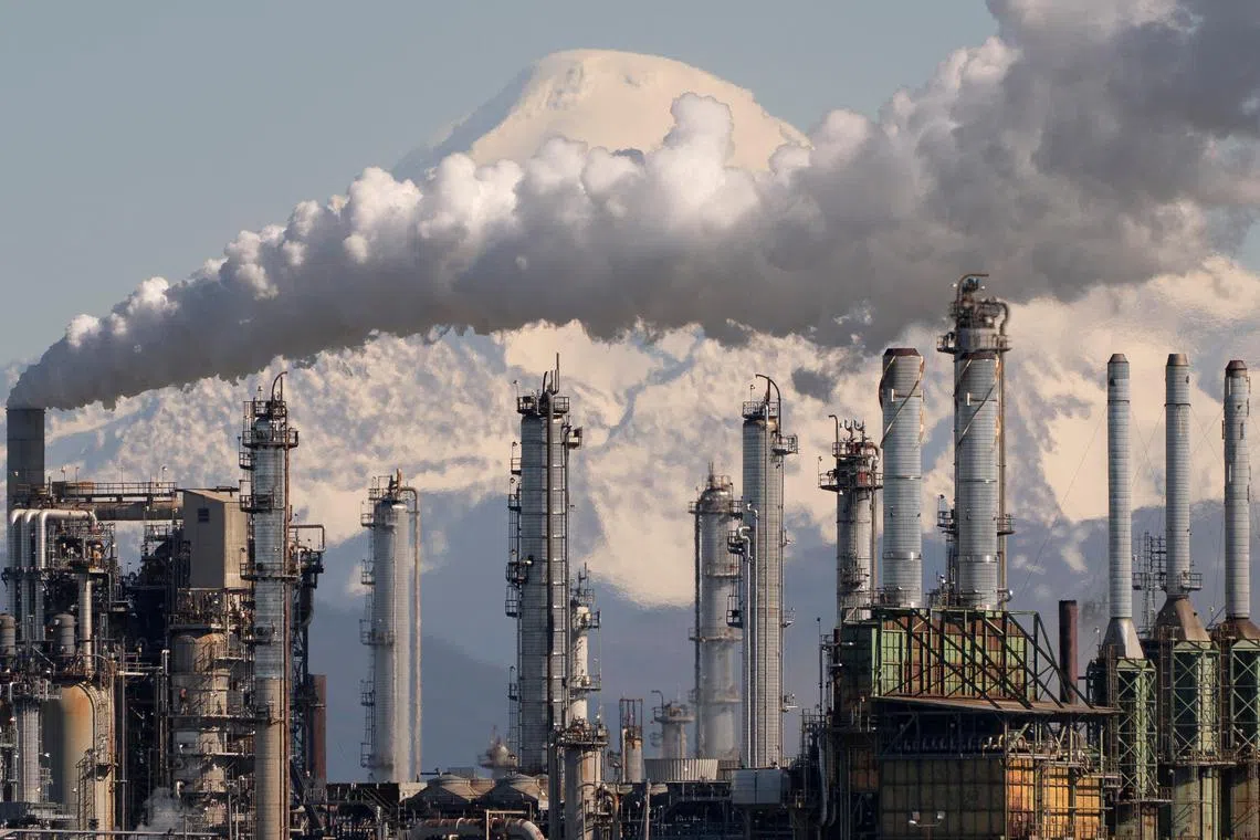 FILE PHOTO: A view shows Marathon Petroleum's refinery, following Russia's invasion of Ukraine, in Anacortes, Washington, U.S., March 9, 2022.  REUTERS/David Ryder/File Photo