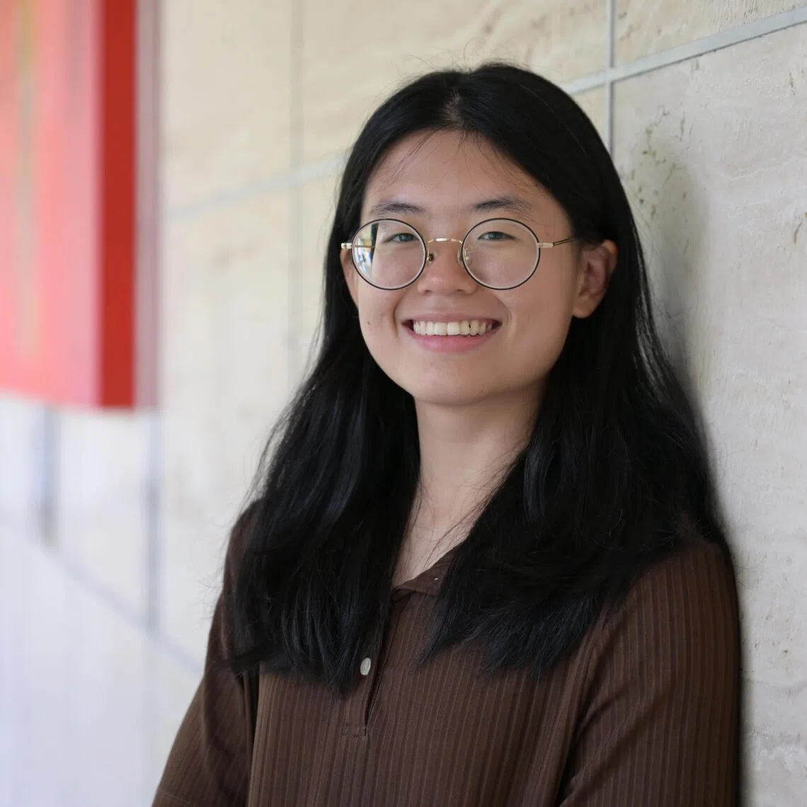 Profile of SPH Foundation's Lim Kim San Memorial Scholarship holder Shira Ong, a third-year student at SMU. She received the scholarship in 2025 and will be supported for her studies until she graduates. Before receiving the scholarship, she had to juggle multiple part-time jobs to cover her school fees.