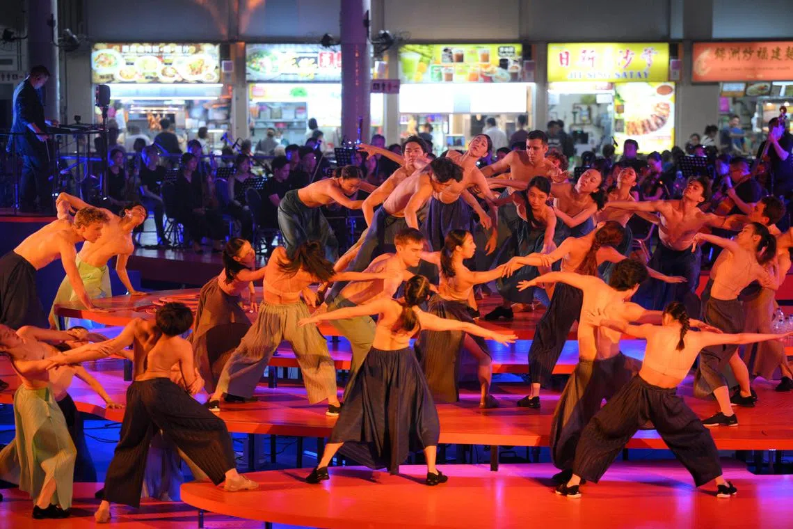 Dancers perform Pact of Water as part of The Sea and the Neighbourhood, at the Bedok Town Square next to the Bedok Interchange Hawker Centre on May 16, 2025.