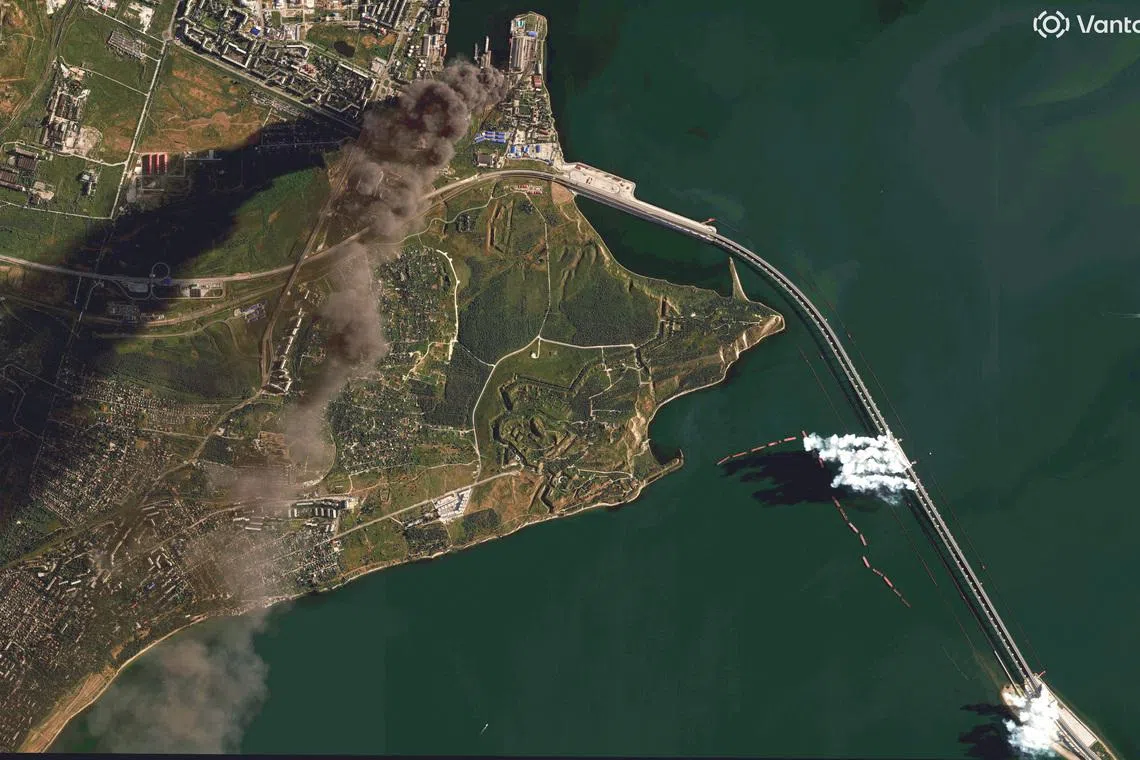 A satellite image shows burning oil storage tanks and smoke rising from the Crimea Bridge, amid Russia-Ukraine conflict, Crimea, June 22, 2026. Vantor/Handout via REUTERS