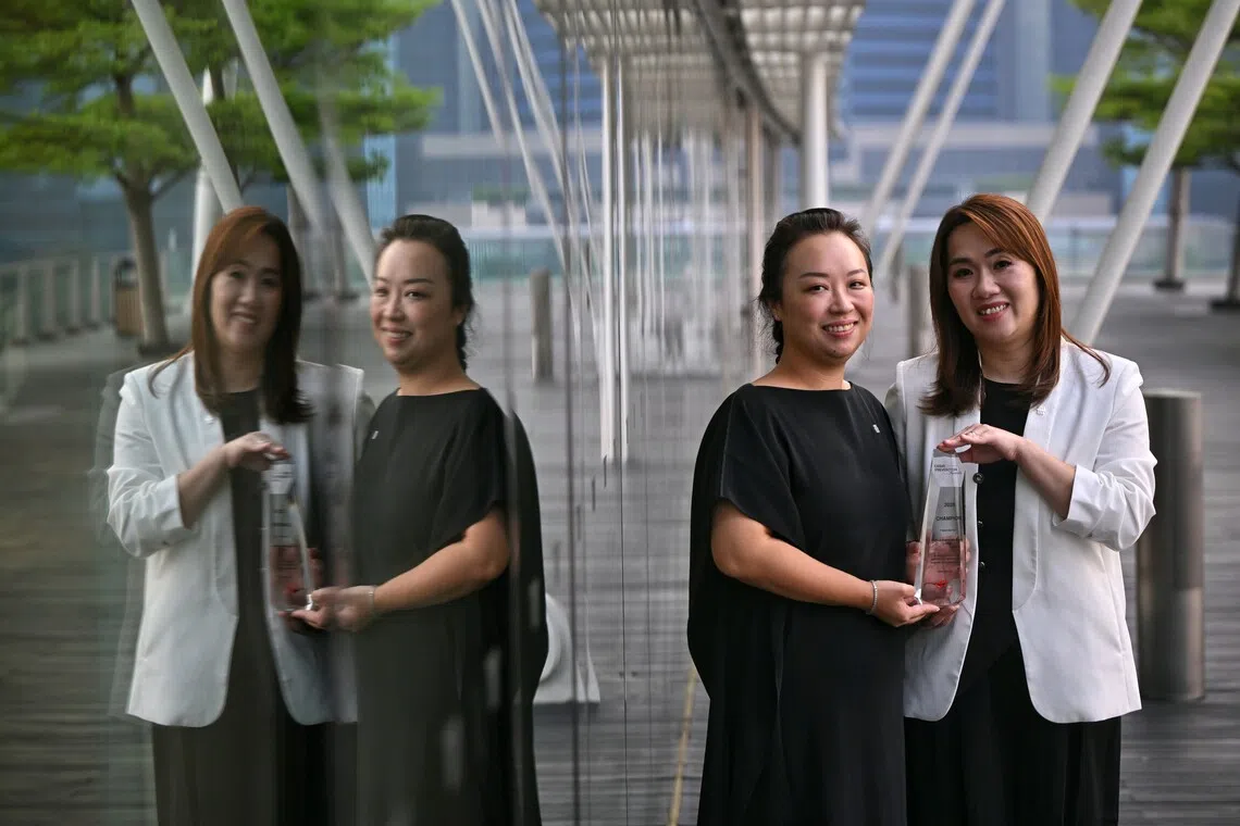 (From left) Ms Luo Lan, 40, Deputy Branch Manager, UOB, Ms Tricia Tan, 45, Deputy Branch Manager, UOB, at Sands Expo and Convention Centre on Sep 4, 2026. /This second edition of the NCPC Crime Prevention Awards recognises organisations that have gone above and beyond to take proactive steps in crime prevention, working closely with NCPC to strengthen safety and build more resilient communities.