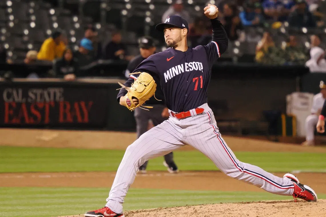 FILE PHOTO: Jul 14, 2023; Oakland, California, USA; Minnesota Twins relief pitcher Jovani Moran (71) pitches the ball against the Oakland Athletics during the seventh inning at Oakland-Alameda County Coliseum. Mandatory Credit: Kelley L Cox-USA TODAY Sports/File photo