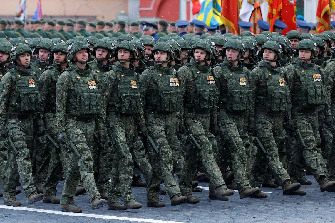 FILE PHOTO: Russian service members, who were involved in the country's military campaign in Ukraine, march in columns during a military parade on Victory Day, which marks the 79th anniversary of the victory over Nazi Germany in World War Two, in Red Square in Moscow, Russia, May 9, 2024. REUTERS/Maxim Shemetov/File Photo