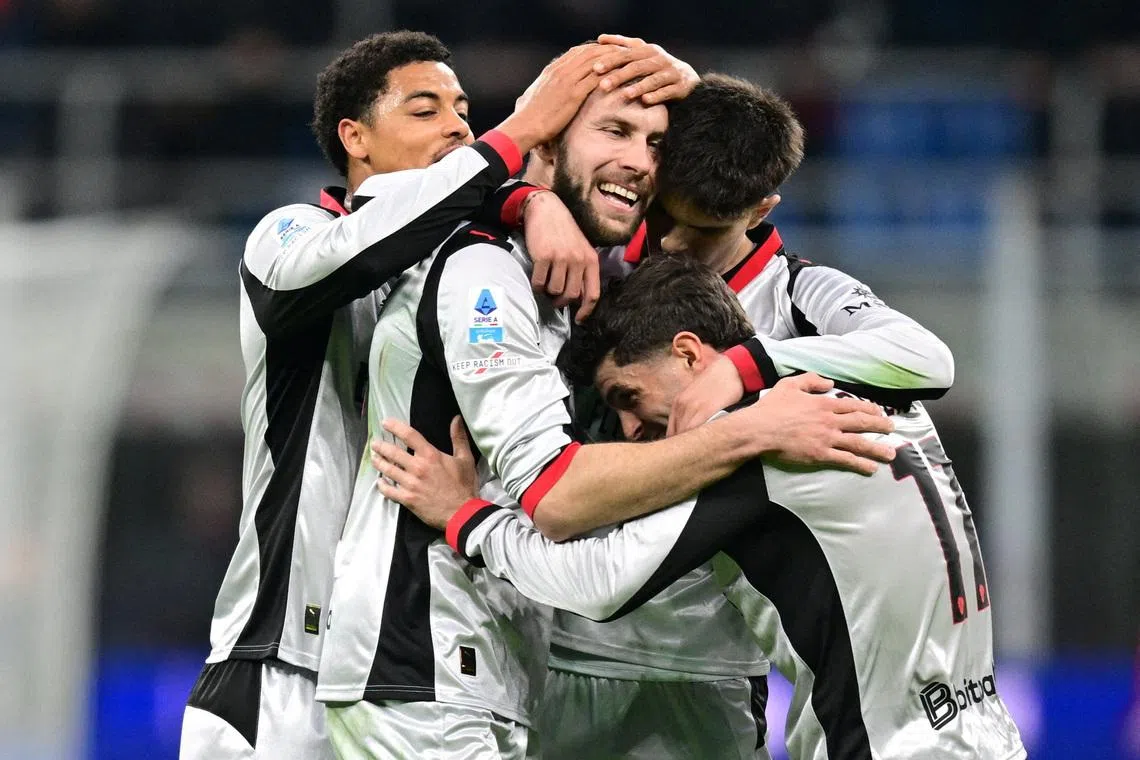 FILE PHOTO: Soccer Football - Serie A - AC Milan v Torino - San Siro, Milan, Italy - March 21, 2026 AC Milan's Strahinja Pavlovic celebrates scoring their first goal with teammates REUTERS/Daniele Mascolo/FIle Photo