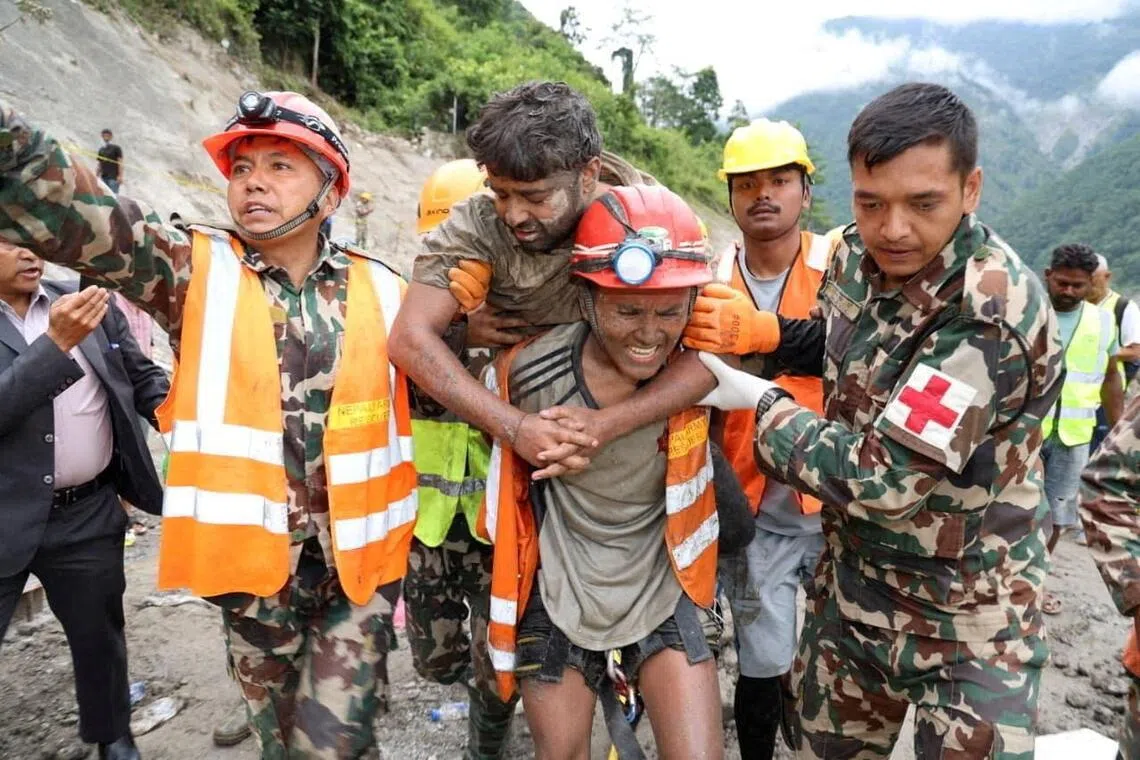Mechanical foreman Sanjay Sah is rescued alive from a tunnel at the Trishuli-3A Hydropower Project.