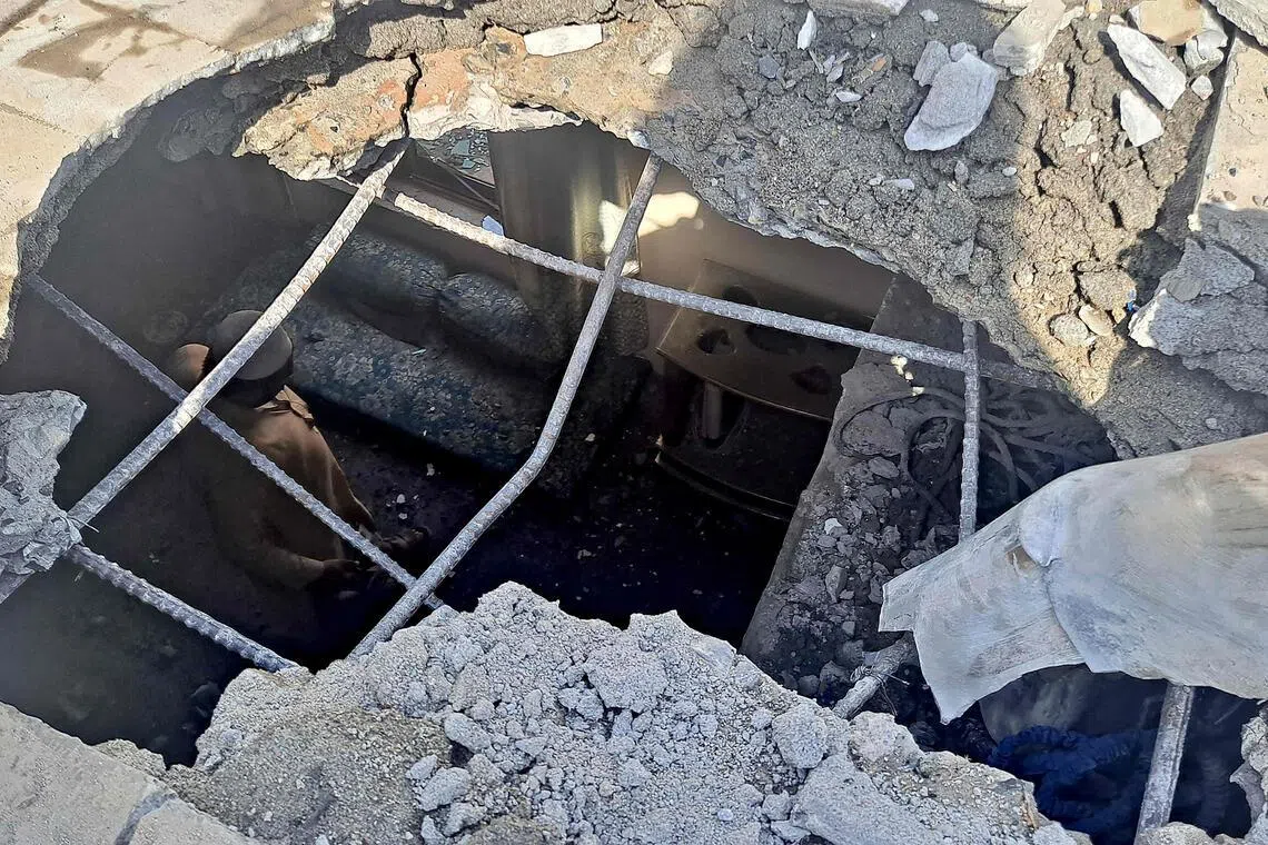 A resident looks at the remains of his house damaged by cross-border shelling at Khyber district, near the frontier province of Khyber Pakhtunkhwa.