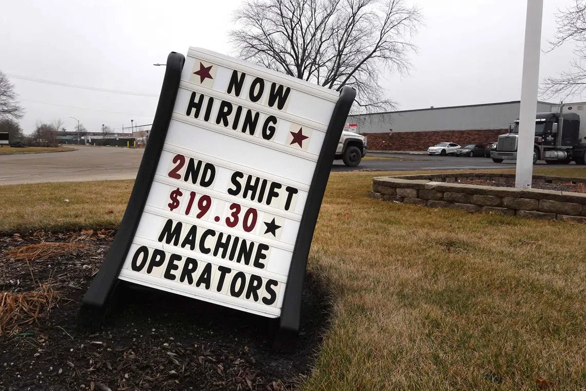 BENSENVILLE, ILLINOIS - JANUARY 06: A sign advertises job openings outside a business on January 06, 2023 in Bensenville, Illinois. Employers added 223,000 jobs in December, a sign that the U.S. economy is continuing to produce jobs, but at a slowing pace.   Scott Olson/Getty Images/AFP (Photo by SCOTT OLSON / GETTY IMAGES NORTH AMERICA / Getty Images via AFP)