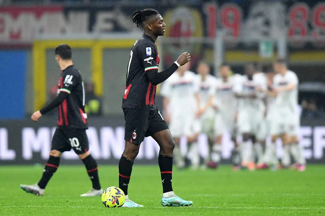 FILE PHOTO: Soccer Football - Serie A - AC Milan v Salernitana - San Siro, Milan, Italy - March 13, 2023 AC Milan's Rafael Leao reacts as Salernitana's Boulaye Dia celebrates scoring their first goal with teammates REUTERS/Daniele Mascolo/File photo