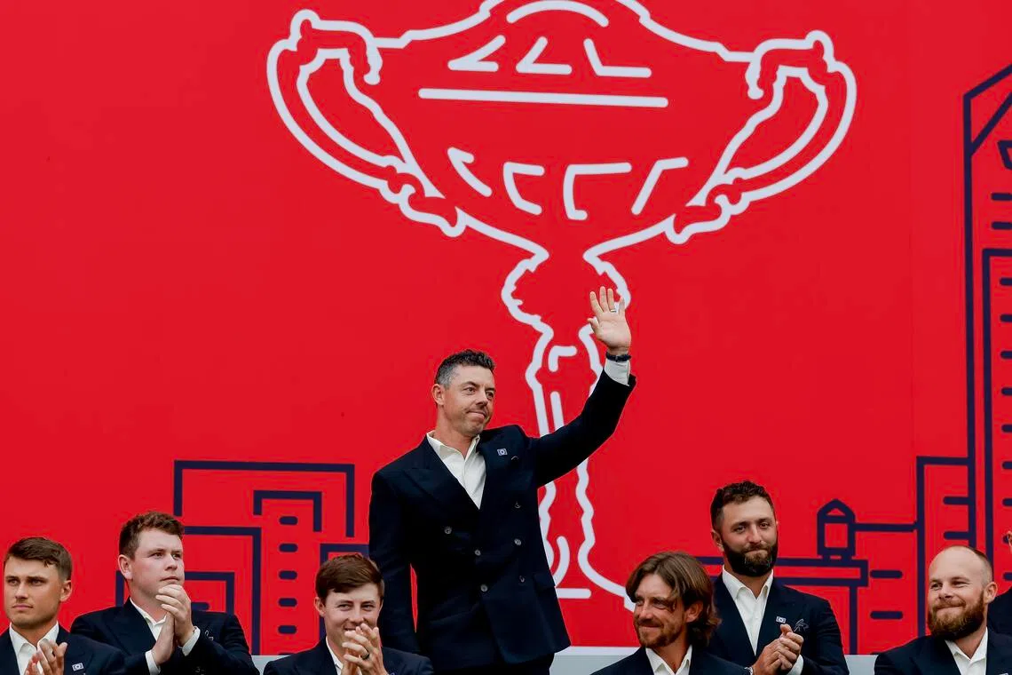 Rory McIlroy of Europe greets the attendence during the opening ceremony before the 2025 Ryder Cup.