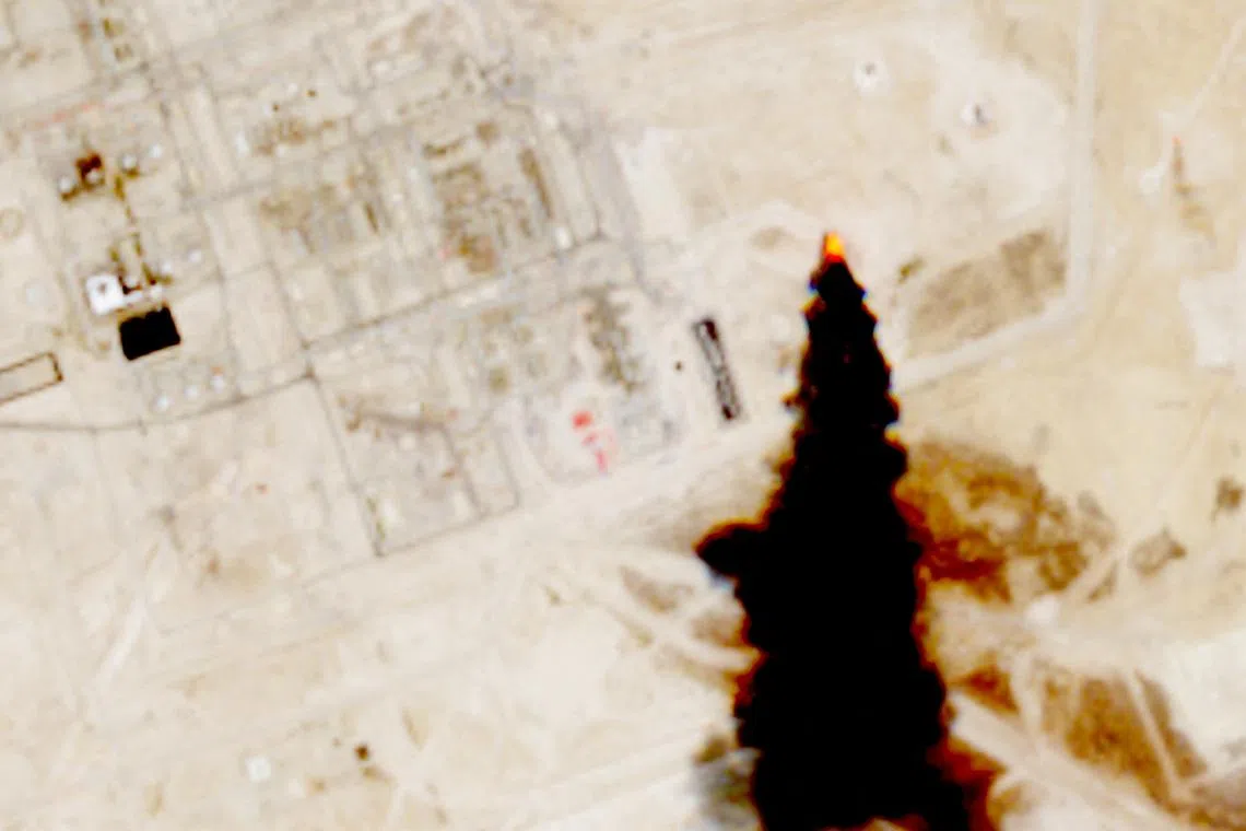 A satellite image shows smoke coming out of an oil facility, as Yemen's Iran-aligned Houthis said on Monday they targeted a number of sensitive crude oil supply and transport sites, according to a statement by the group's military spokesperson Yahya Sare, in Abqaiq, Saudi Arabia July 27, 2026. Courtesy European Union/Copernicus Sentinel-2/Handout via REUTERS