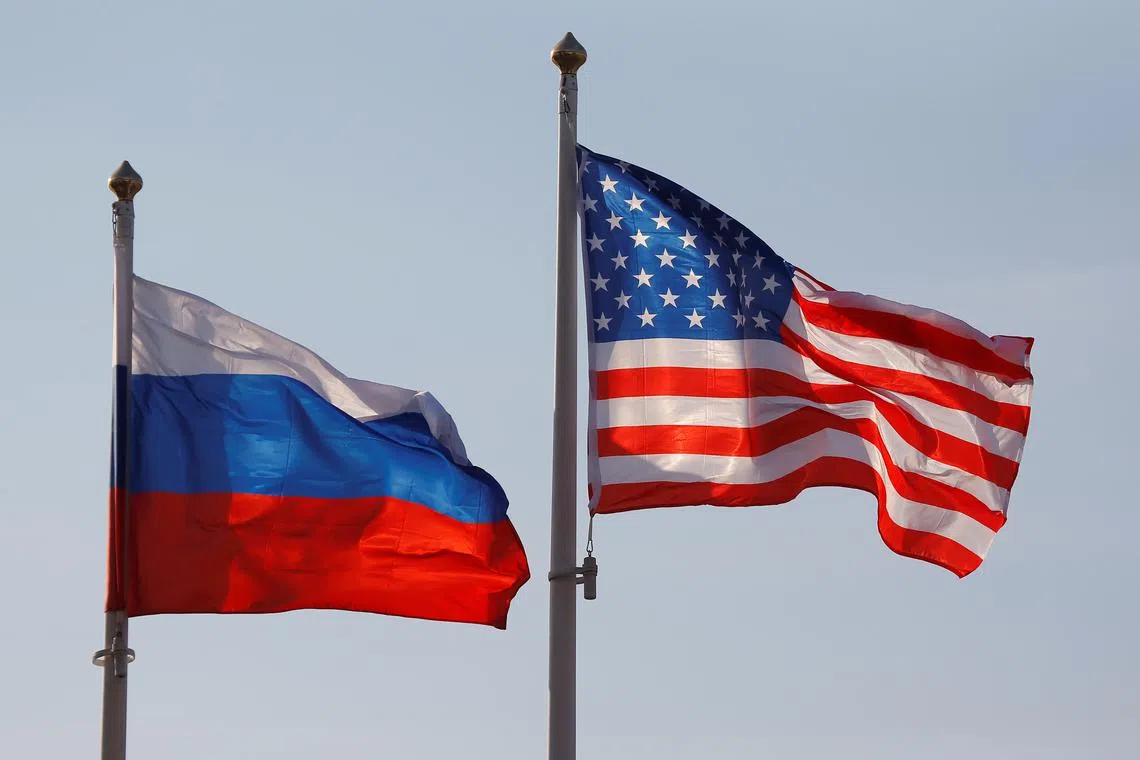 FILE PHOTO: National flags of Russia and the U.S. fly at Vnukovo International Airport in Moscow, Russia April 11, 2017.  REUTERS/Maxim Shemetov/ File Photo