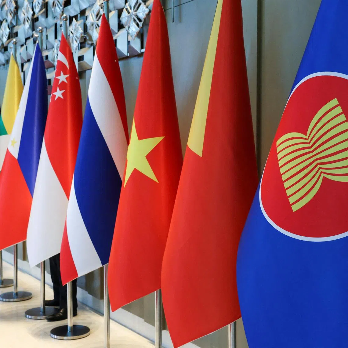 The ASEAN flag is placed alongside the flags of its member countries ahead of the ASEAN Foreign Ministers' Retreat in Langkawi, Malaysia January 17, 2025. REUTERS/Hasnoor Hussain