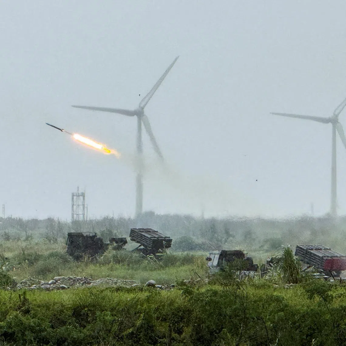 A Thunderbolt-2000 multiple launch rocket system (MLRS) fires rockets during a live-fire military exercise, which simulates an enemy invasion, in Taichung, Taiwan June 9, 2026. Picture taken with a mobile phone. REUTERS/Angie Teo