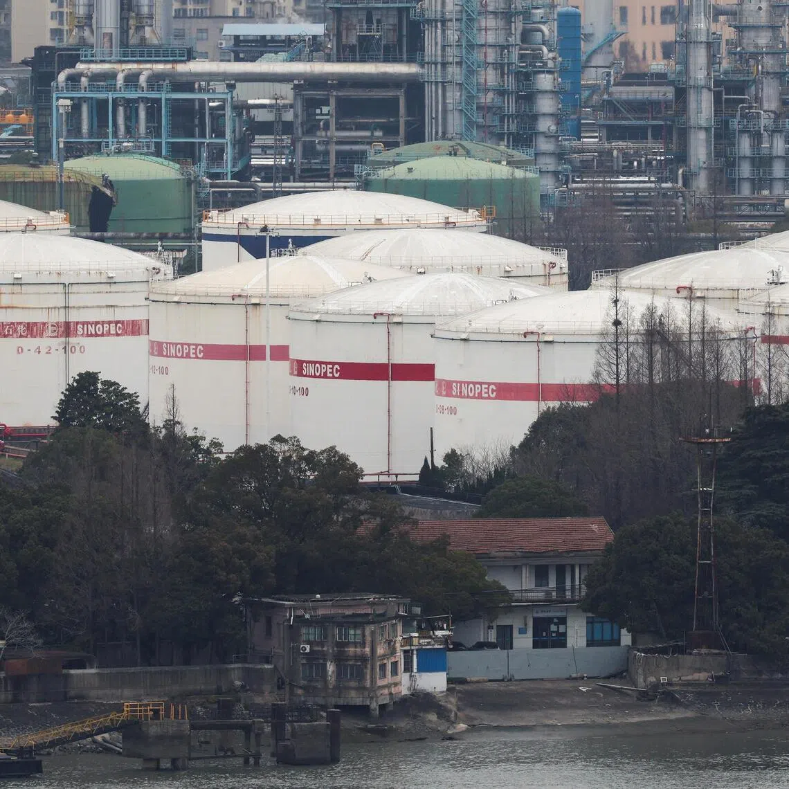 Oil storage tanks and facilities of a Sinopec plant in Shanghai last month.