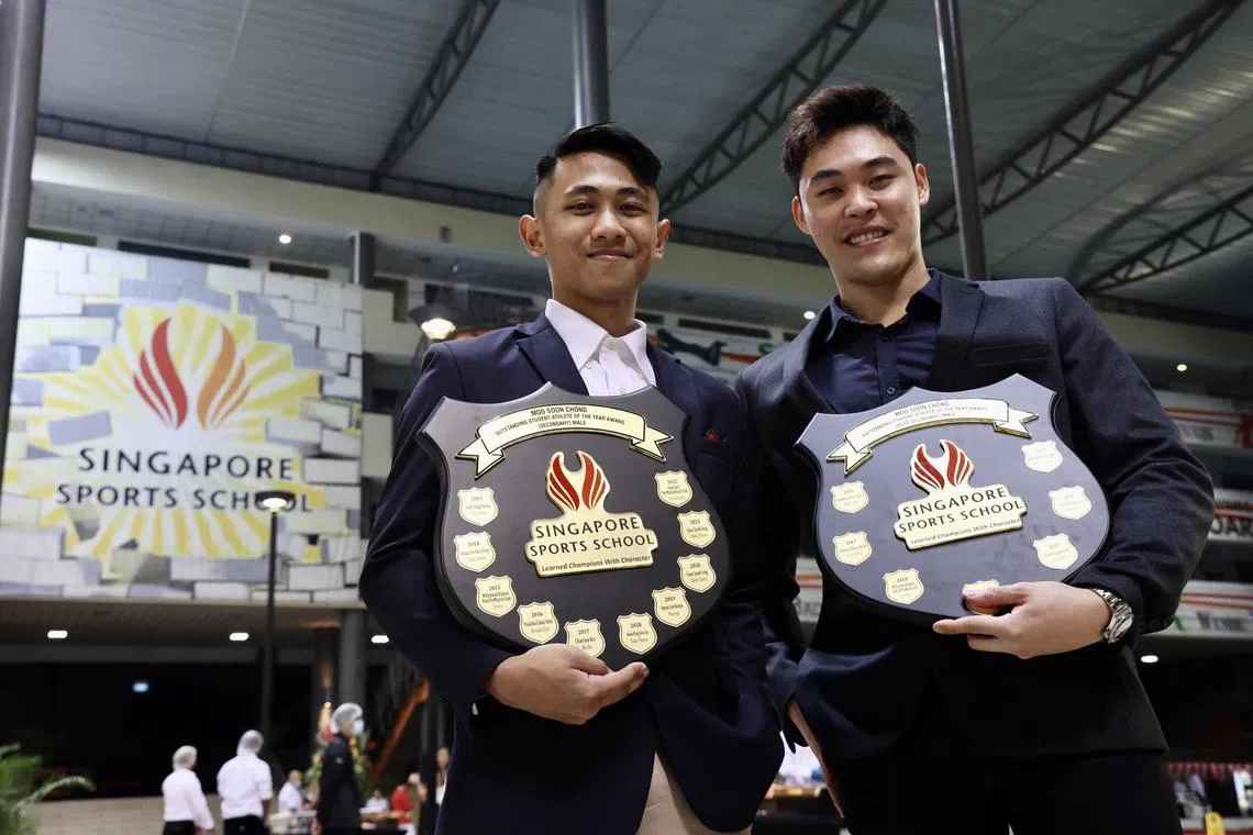 Silat exponent Aniq 'Asri Yazid (left) and swimmer Maximillian Ang won the Singapore Sports School’s Moo Soon Chong outstanding student-athlete of the year awards on Tuesday.