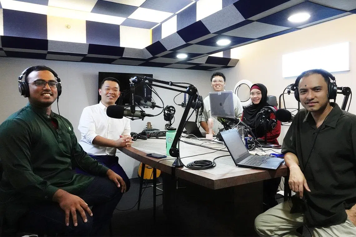 (From left) Our guests for this episode, Mr Mohamad Arshad and Mr Cho Ming Xiu, talks to (from right) ST's podcast editor Ernest Luis, ST's podcast producers Fa'izah Sani and Hadyu Rahim.