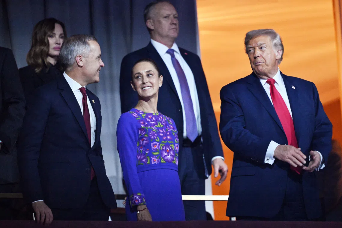 US President Donald Trump (right) met with Canadian Prime Minister Mark Carney (left) and Mexican President Claudia Sheinbaum on the sidelines of the draw for the 2026 World Cup.