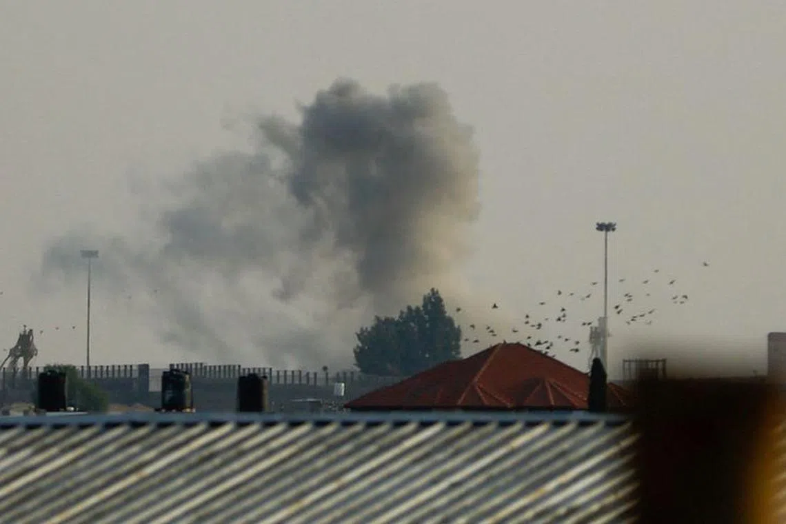 Smoke rises following Israeli strikes at the border with Egypt, as the conflict between Israel and Palestinian Islamist group Hamas continues, as seen from Rafah, southern Gaza Strip October 22, 2023.REUTERS/Ibraheem Abu Mustafa