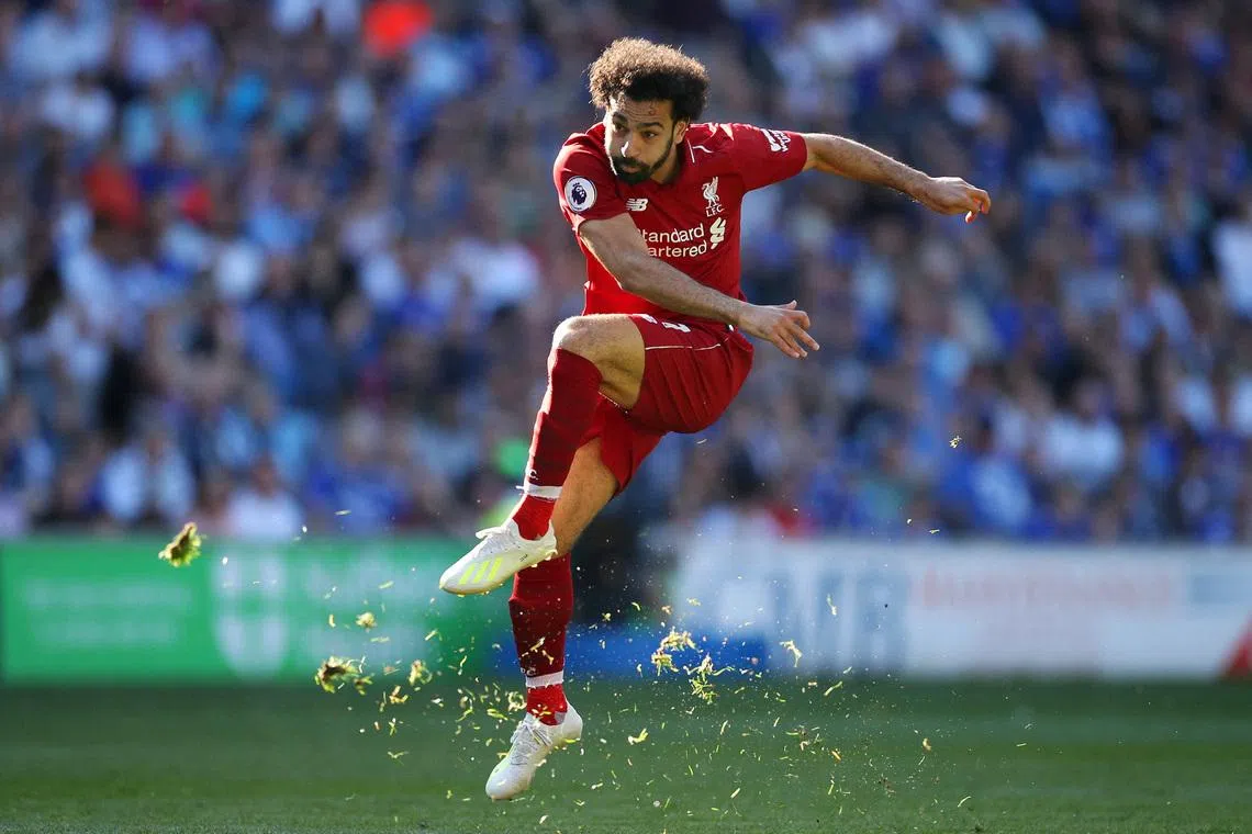 Soccer Football - Premier League - Cardiff City v Liverpool - Cardiff City Stadium, Cardiff, Britain - April 21, 2019   Liverpool's Mohamed Salah shoots at goal. Action Images via Reuters/Carl Recine