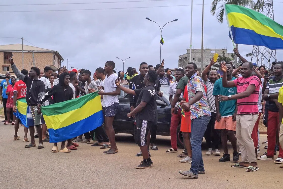 Hundreds took to the streets of Gabon's capital Libreville to celebrate a coup that ousted President Ali Bongo.