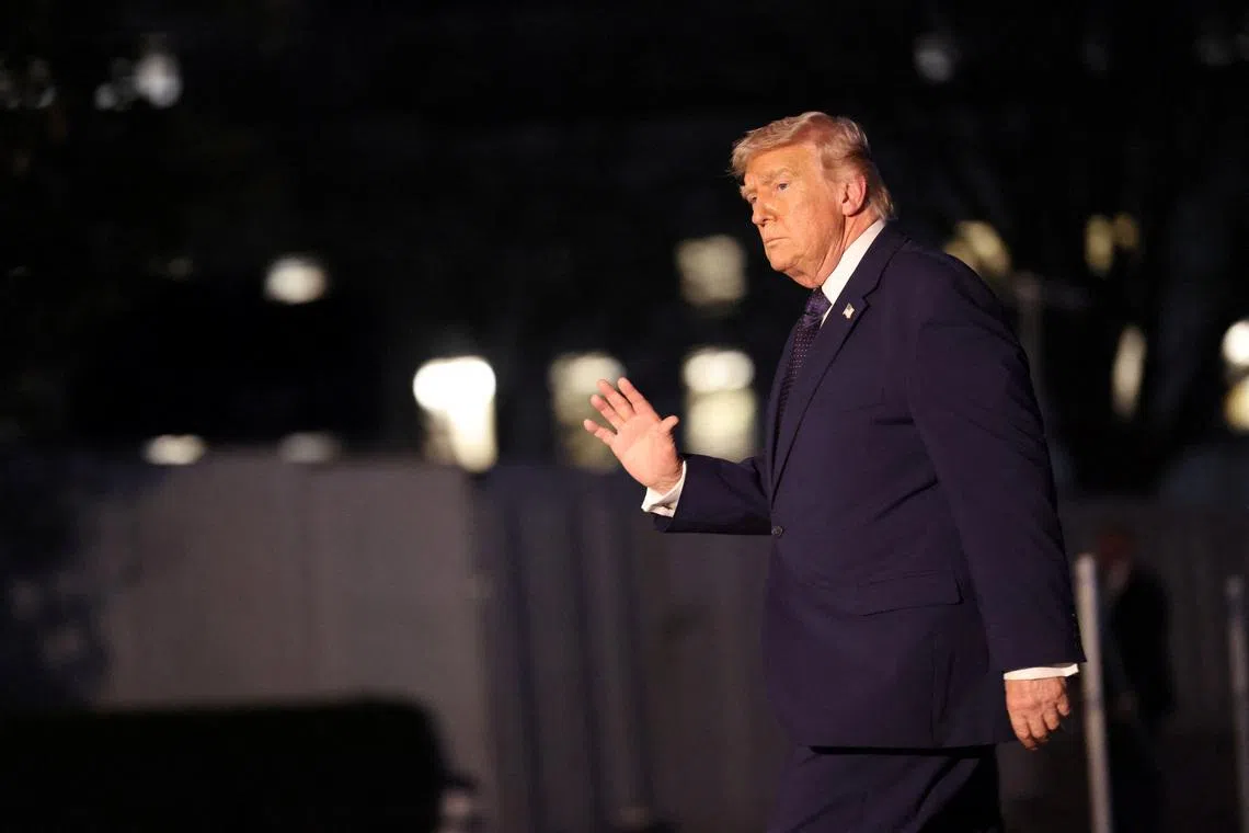 U.S. President Donald Trump waves as he arrives at the White House from Florida, in Washington, D.C., U.S., March 9, 2026. REUTERS/Evelyn Hockstein