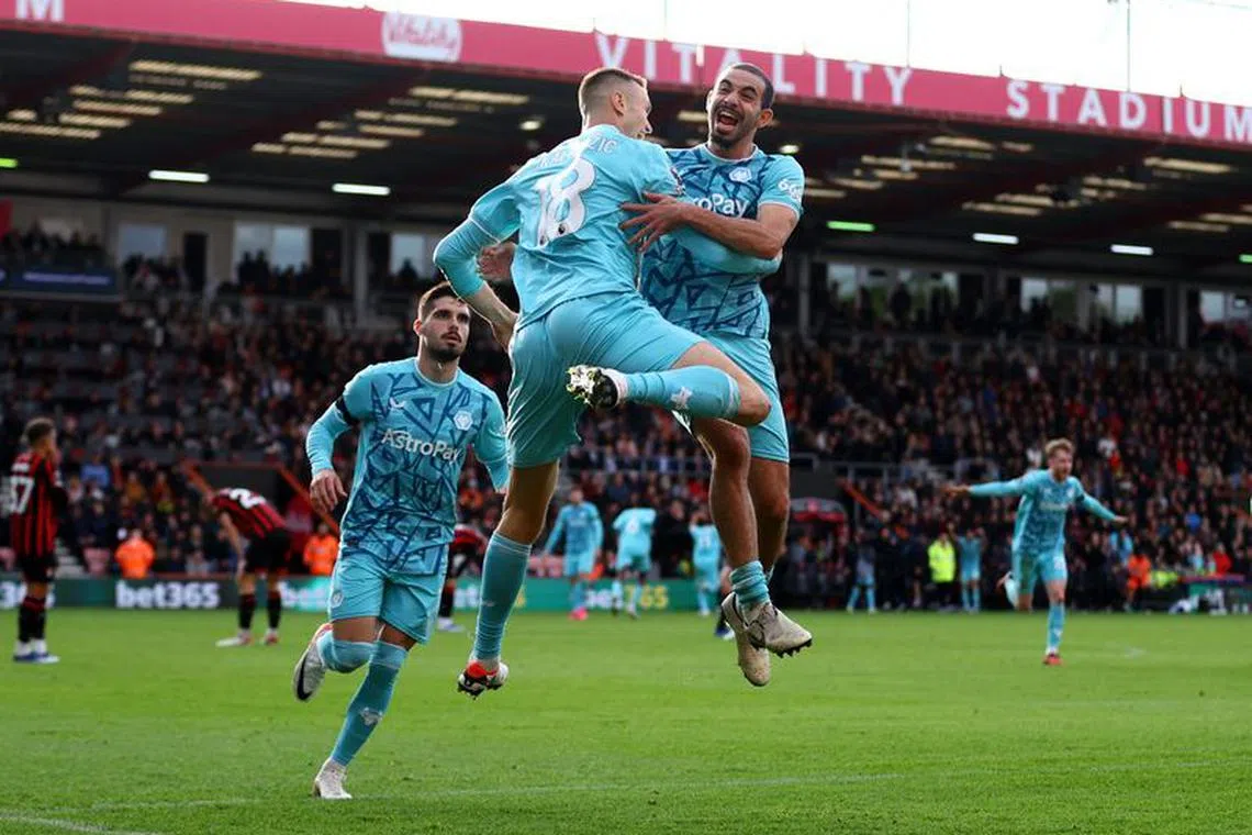 Soccer Football - Premier League - AFC Bournemouth v Wolverhampton Wanderers - Vitality Stadium, Bournemouth, Britain - October 21, 2023 Wolverhampton Wanderers' Sasa Kalajdzic celebrates scoring their second goal with teammate Rayan Ait-Nouri Action Images via Reuters/Matthew Childs