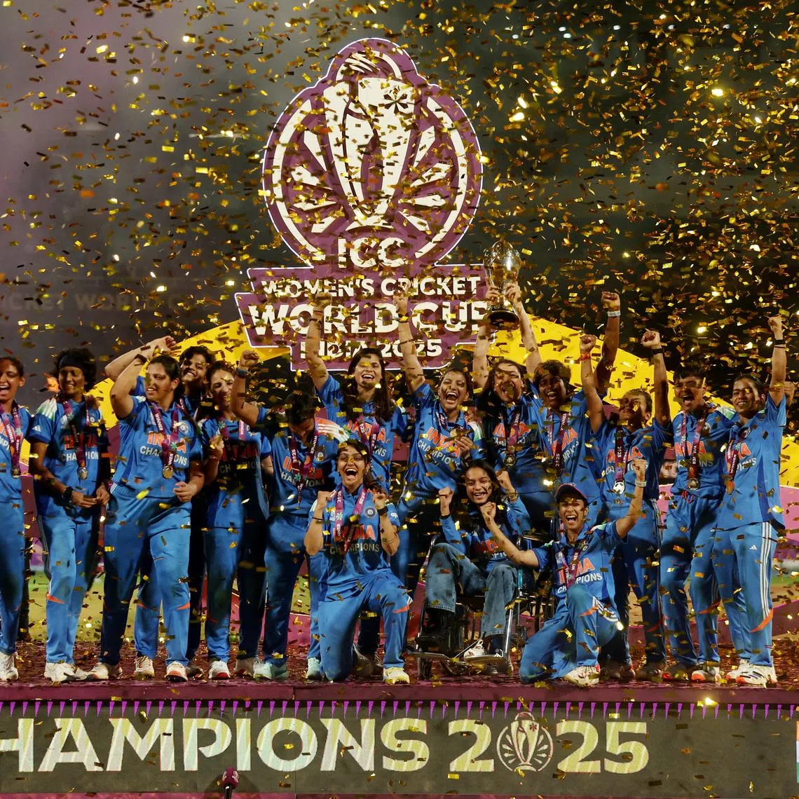 Cricket - ICC Women's World Cup - Final - India v South Africa - DY Patil Stadium, Navi Mumbai, India - November 2, 2025 India players celebrate with the trophy after winning the ICC Women's World Cup REUTERS/Francis Mascarenhas