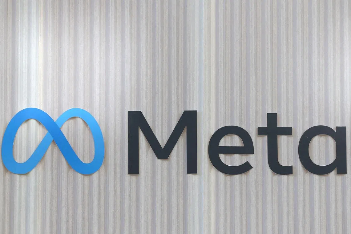 FILE PHOTO: The logo of Meta is seen at the entrance of the company's temporary stand ahead of the World Economic Forum (WEF) in Davos, Switzerland January 18, 2025. REUTERS/Yves Herman/File Photo