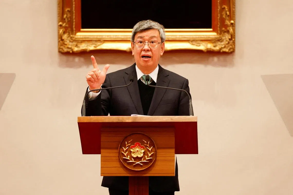FILE PHOTO: Incoming Taiwan Premier Chen Chien-jen speaks during a news conference with Taiwan President Tsai Ing-wen and outgoing Taiwan Premier Su Tseng-chang at the presidential office in Taipei, Taiwan January 27, 2023. REUTERS/Carlos Garcia Rawlins/File Photo