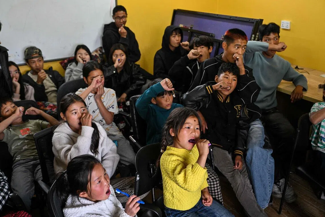 Children learn about oral hygiene in Ulaanbaatar from the Misheel Kids Foundation’s fleet of mobile dental clinics.