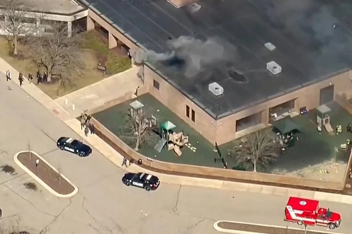 Smoke rises from the building after the Michigan State Police reported an active shooting incident at the Temple Israel Synagogue in West Bloomfield, Michigan, U.S., March 12, 2026 in a still image from video.   ABC Affiliate WXYZ via REUTERS