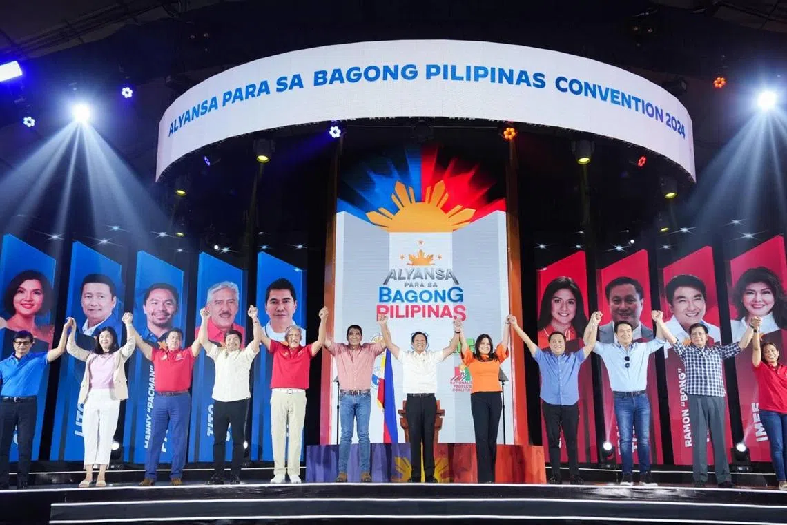 macandidate08 - Philippine President Ferdinand Marcos Jr on September 26, 2026 raises the hands of the 11 out of the 12 senatorial candidates he is endorsing for the May 2025 midterm elections. A majority of those in Mr Marcos' slate are poised to win, pre-election surveys say. 


Credit: Presidential Communications Office