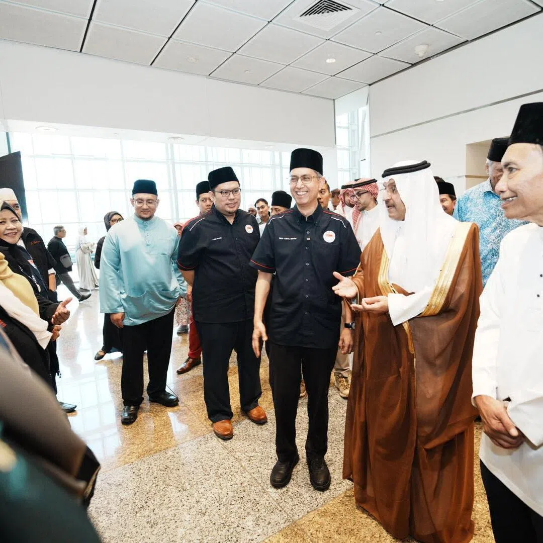 Acting Minister-in-charge of Muslim Affairs Faishal Ibrahim (centre) with Saudi Arabia’s ambassador to Singapore Mohammad Abdullah Alghamdi (second from right) at the pre-departure briefing for 2026 haj pilgrims at Suntec Singapore Convention and Exhibition Centre on April 25. 