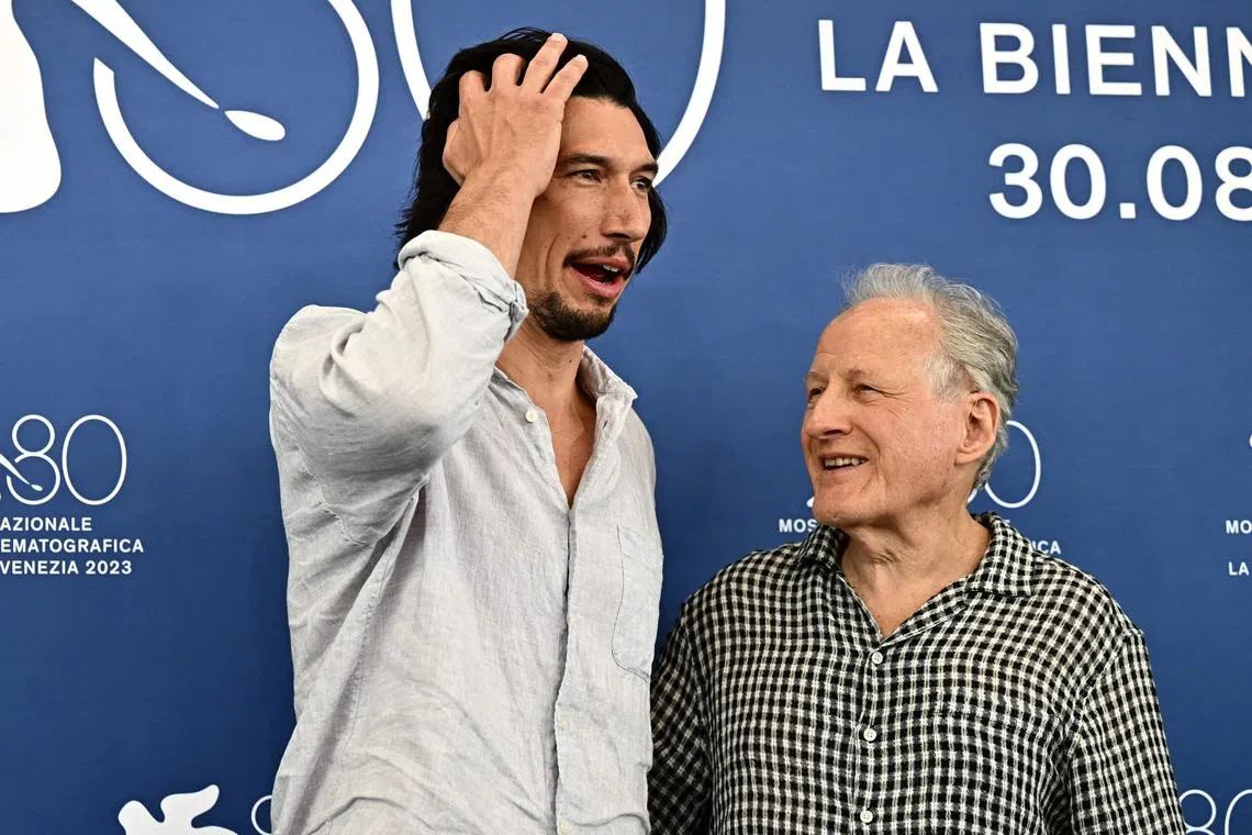 US actor Adam Driver (left) and US director Michael Mann at the photocall for the movie Ferrari in Venice.
