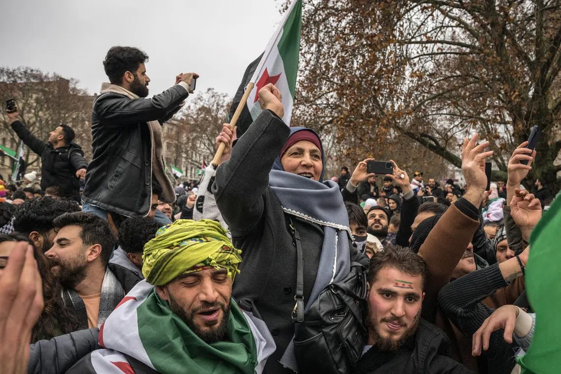 Members of the Syrian community in Berlin celebrate the end of Syrian dictator Bashar al-Assad's rule.