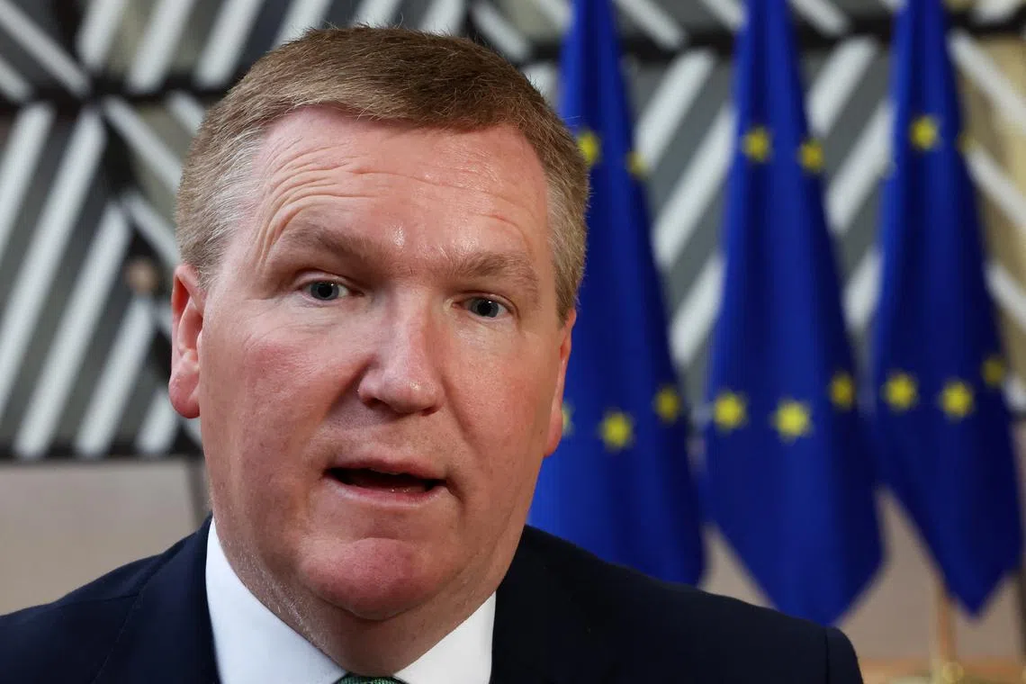 FILE PHOTO: Irish Minister for Finance Michael McGrath arrives to attend the Eurozone finance ministers meeting in Brussels, Belgium December 7, 2023. REUTERS/Yves Herman/File Photo