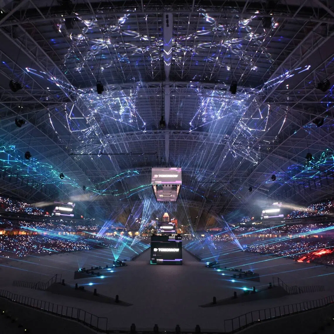 Singer Jasmine Sokko descended from a cube hung from the stadium’s ceiling to dance in the air above a sea of lights during the National Day Parade at the National Stadium on Aug 9.