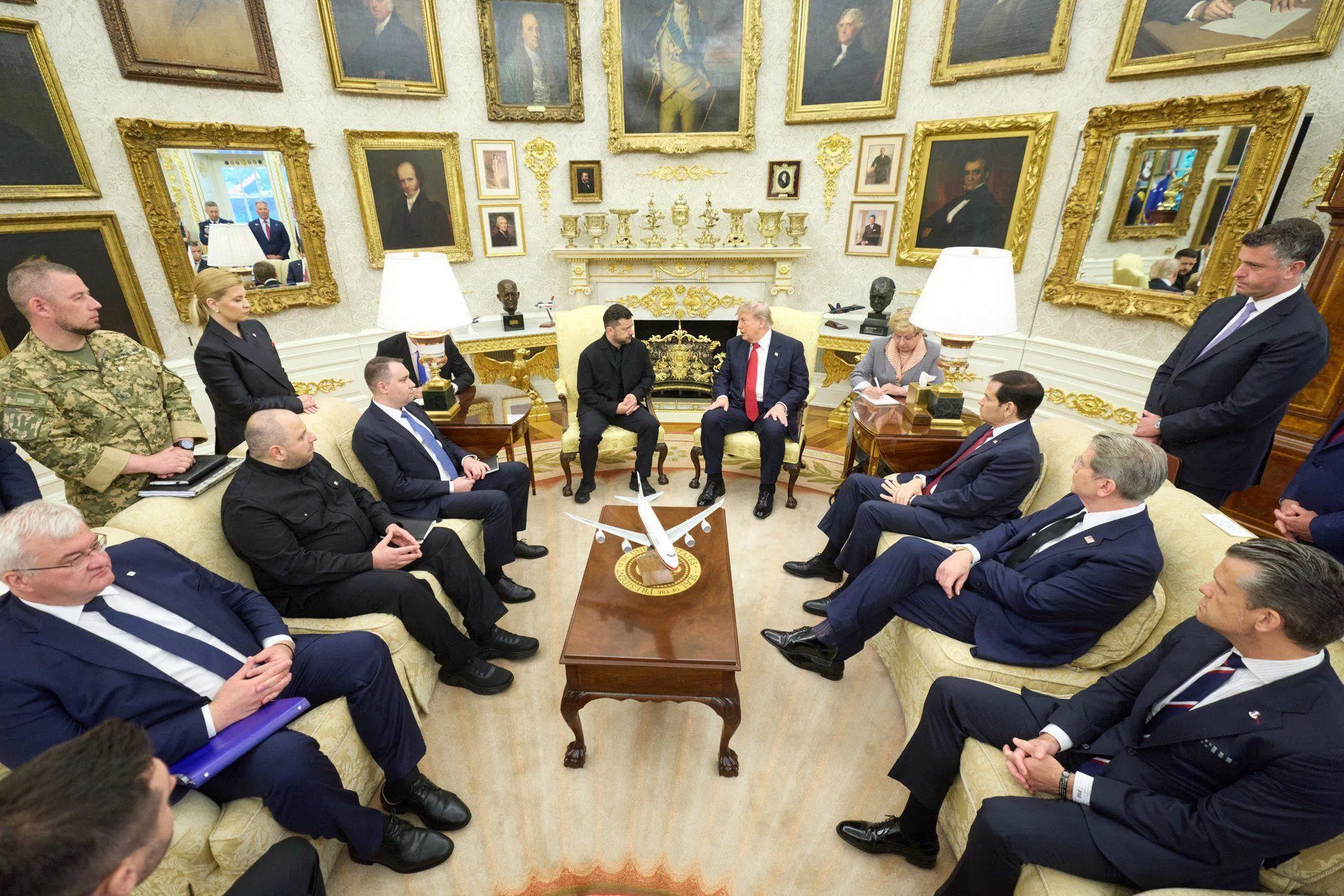 Ukrainian President Volodymyr Zelensky (centre, left) speaking with US President Donald Trump during their Oval Office meeting on July 28.