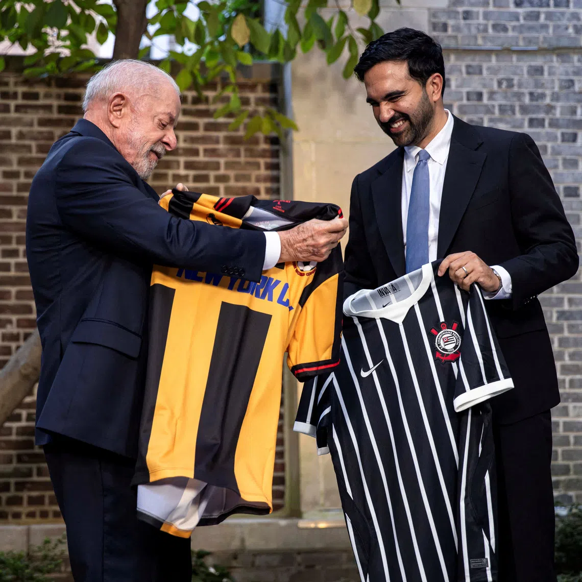 FILE PHOTO: New York City Mayor Zohran Mamdani and Brazilian President Luiz Inacio Lula da Silva, exchange soccer jerseys while speaking to reporters after meeting in New York, US, September 21, 2026. Dave Sanders/Pool via REUTERS/File Photo