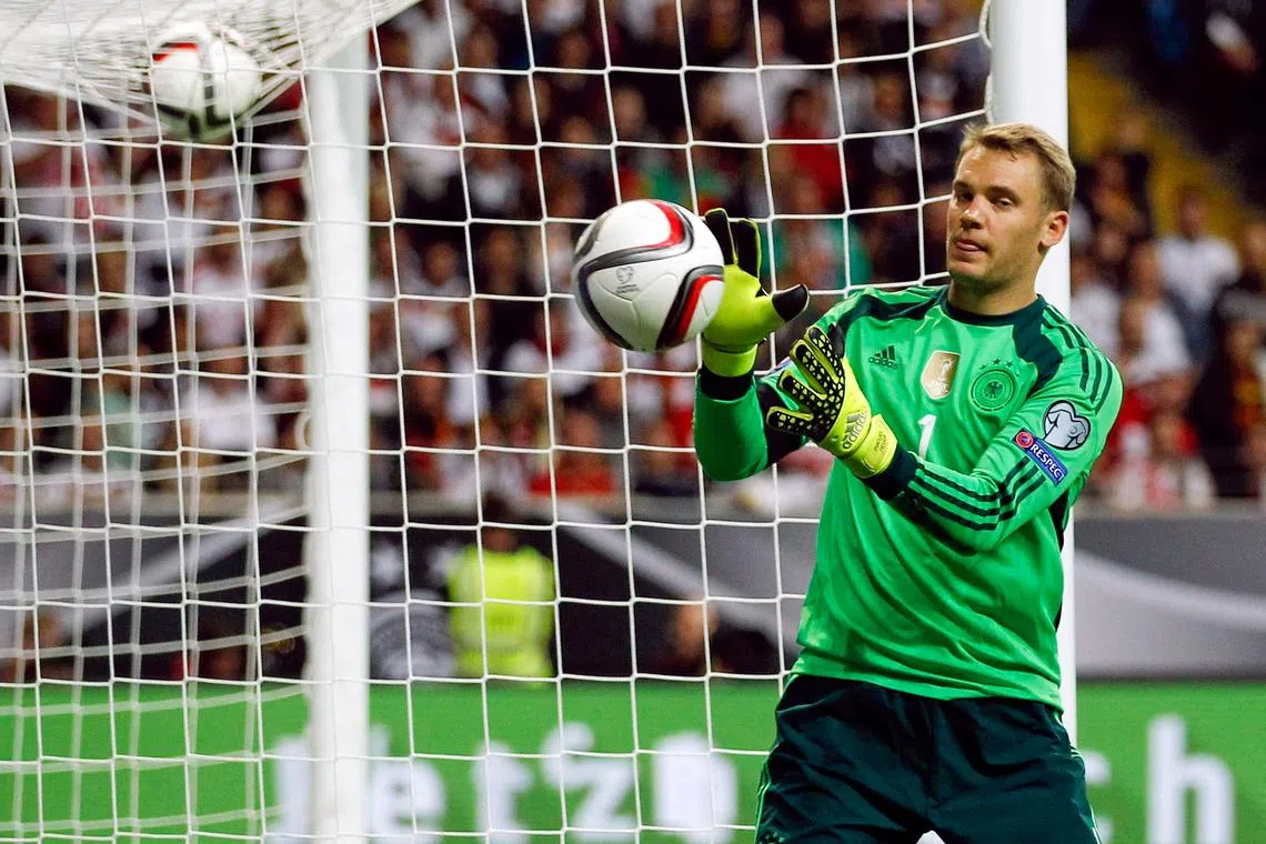 FILE PHOTO: Germany's goalkeeper Manuel Neuer reacts during their Euro 2016 qualification match against Poland in Frankfurt, Germany, September 4, 2015. REUTERS/Ina Fassbender/File Photo