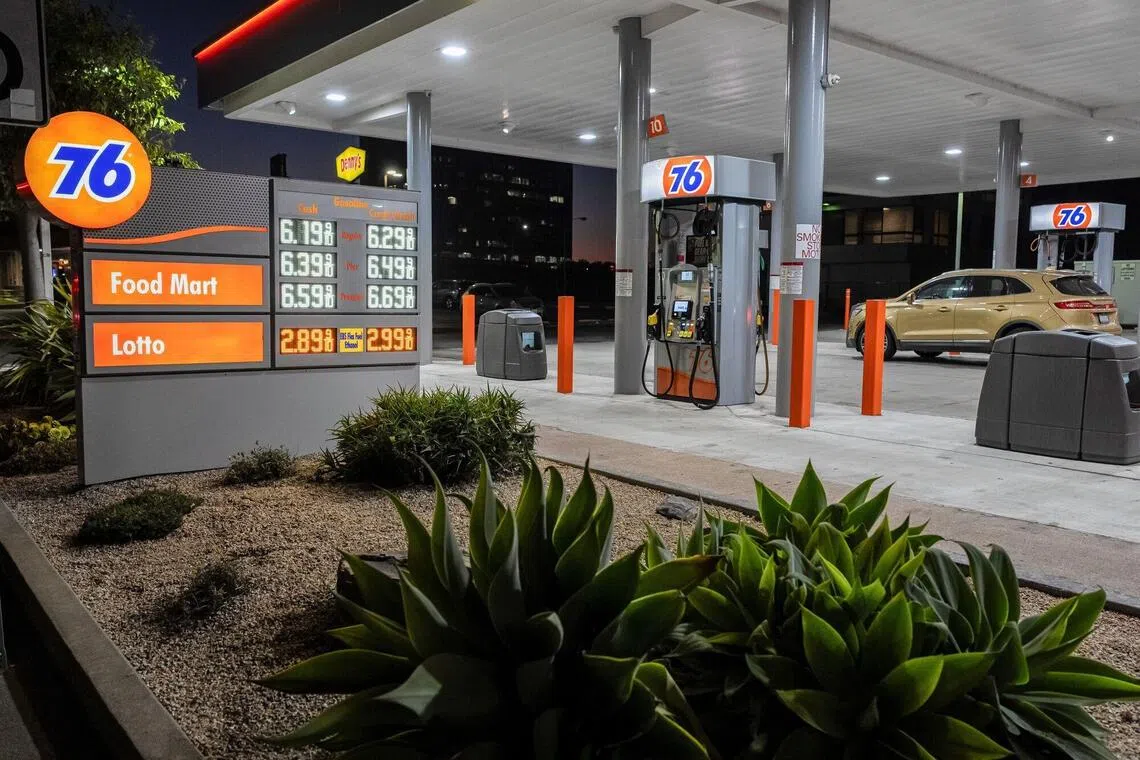 Petrol prices above US$6 a gallon at a gas station in Emeryville, California on Oct 12.